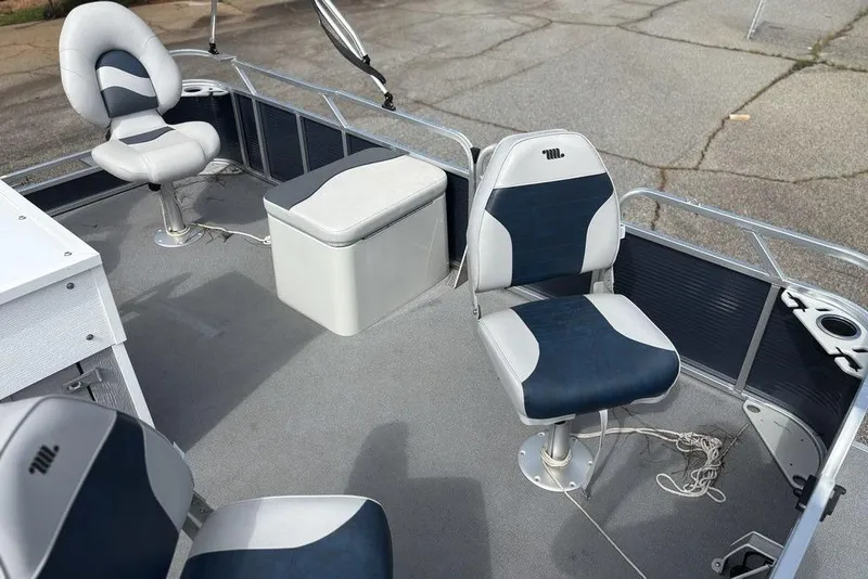Slide: The Image of 2020 Apex Gillgetter 7515 Tiller pontoon boat interior with seating and storage. - 8