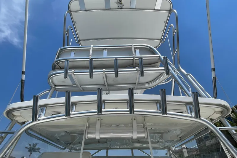 Slide: The Image of 2005 Rampage 33 Express boat tower against clear blue sky. - 13