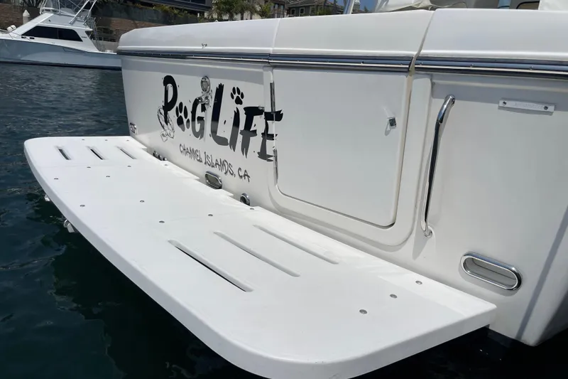 Slide: The Image of 2005 Rampage 33 Express boat with "Pog Life" text, Channel Islands, CA. - 4