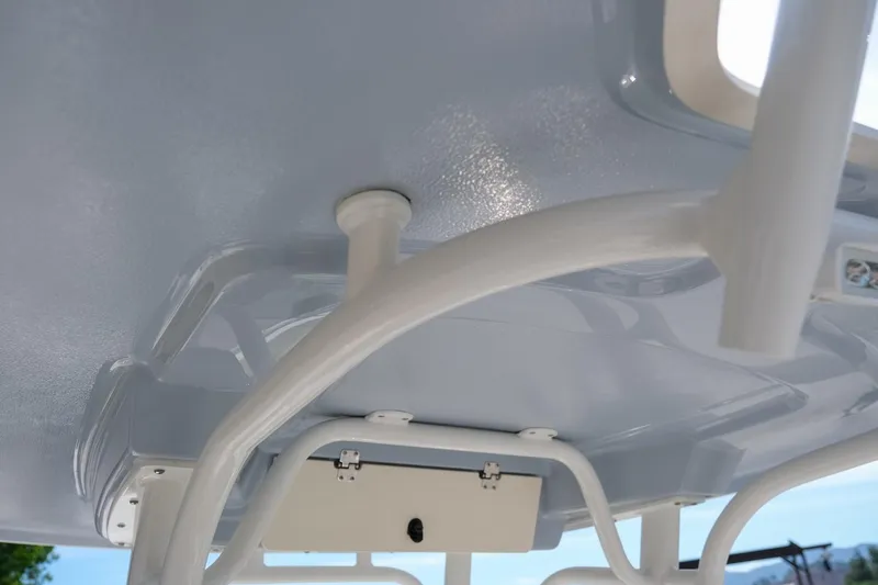 Slide: The Image of 2023 Robalo R230 Center Console boat's T-top structure detail. - 15