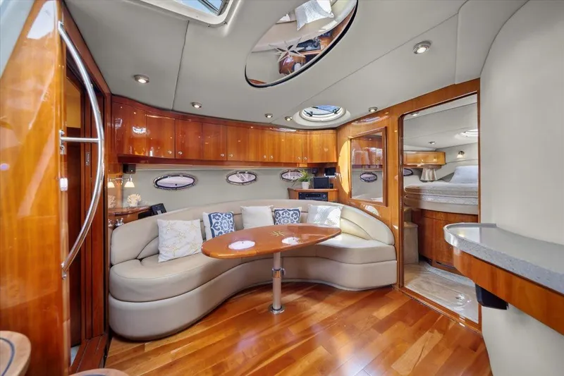 Slide: The Image of Luxurious interior of 2010 Regal Commodore 4460 yacht with elegant wood finishes. - 27