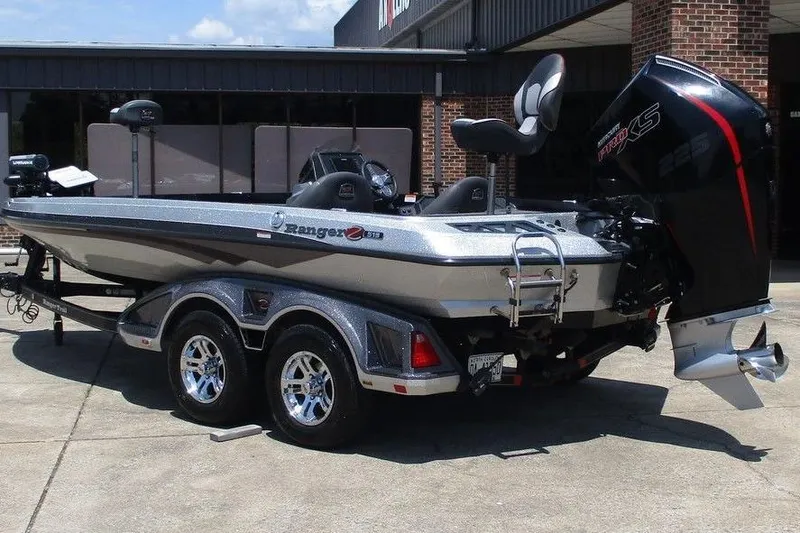 Slide: The Image of 2019 Ranger Z519L boat on trailer, featuring sleek design and powerful engine. - 6