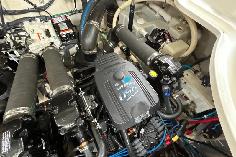 Slide: The Image of Engine compartment of a 2005 Sea Ray 320 Sundancer with MerCruiser 350 MPI engine. - 66