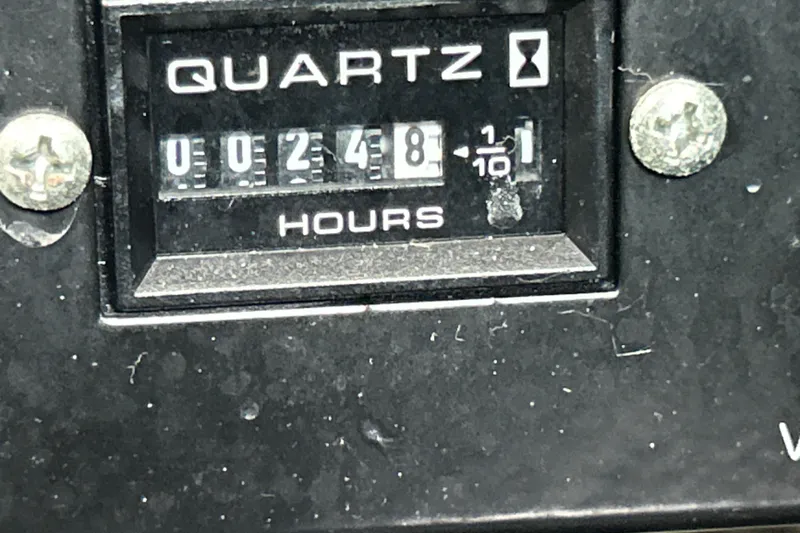 Slide: The Image of Hour meter showing 248 hours on a 2005 Sea Ray 320 Sundancer. - 70
