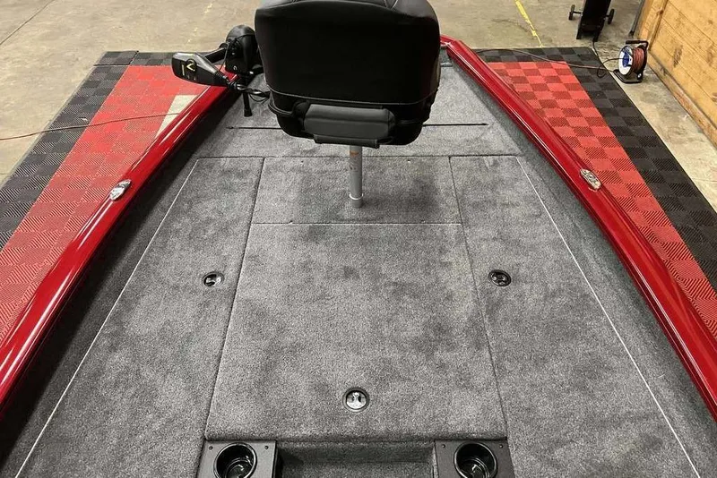 Slide: The Image of 2026 Tracker Pro Team™ 190 boat interior with red accents and central seat. - 8