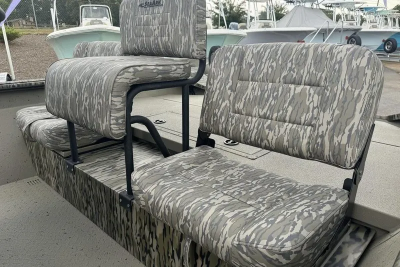 Slide: The Image of Camouflage seating on 2026 SeaArk Shadow 20 Elite CC boat, showcasing durable design. - 10