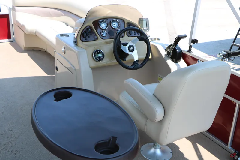 Slide: The Image of Interior of 2014 Veranda Relax V2275 boat with steering console and seating. - 17