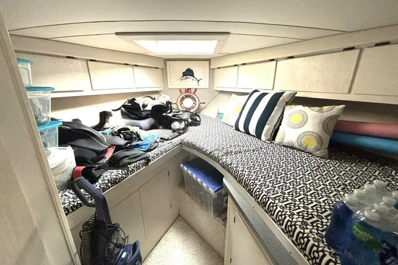 Slide: The Image of Interior cabin of 1987 Davidson 48 Sportfish with storage and seating area. - 44