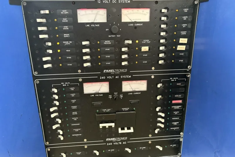 Slide: The Image of Electrical panel on a 1987 Davidson 48 Sportfish boat, featuring 12V DC and 240V AC systems. - 50