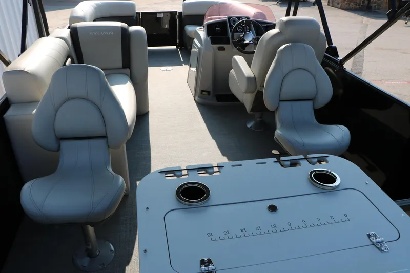 Slide: The Image of 2023 Sylvan Mirage Fish 820 Party Fish interior with seating and control console. - 17