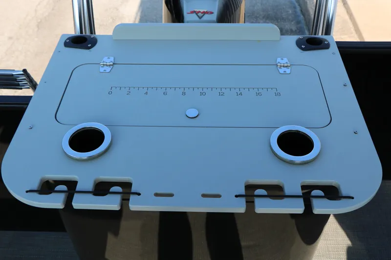 Slide: The Image of 2023 Sylvan Mirage Fish 820 Party Fish boat console with cup holders and measuring scale. - 23