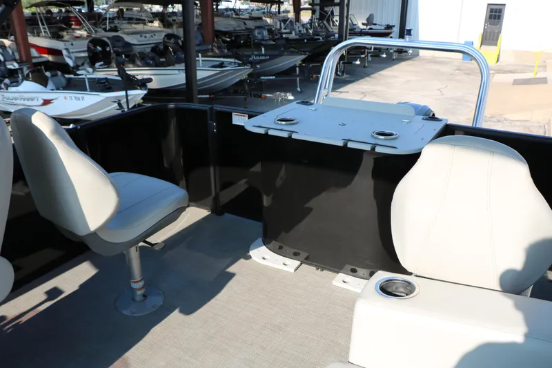 Slide: The Image of 2023 Sylvan Mirage Fish 820 Party Fish interior with seating and fishing station. - 25