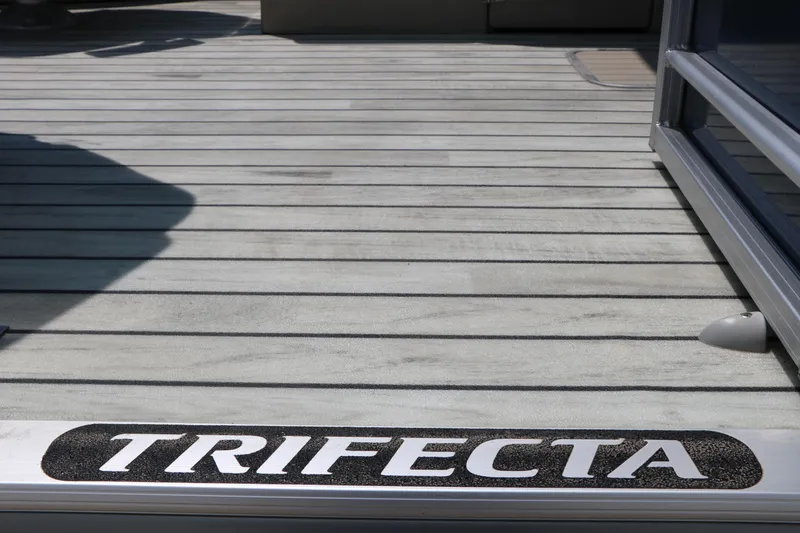 Slide: The Image of 2017 Trifecta 21 F Sts boat deck with logo, showcasing sleek design. - 10