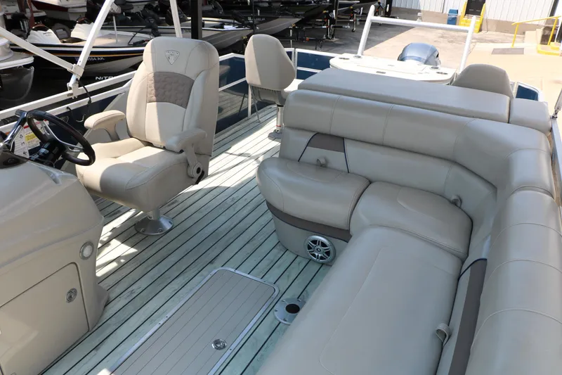 Slide: The Image of Luxurious interior of 2017 Trifecta 21 F Sts pontoon boat with plush seating. - 20
