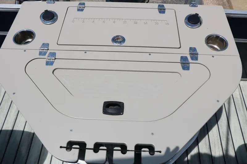 Slide: The Image of 2017 Trifecta 21 F Sts boat deck with storage compartments and cup holders. - 29