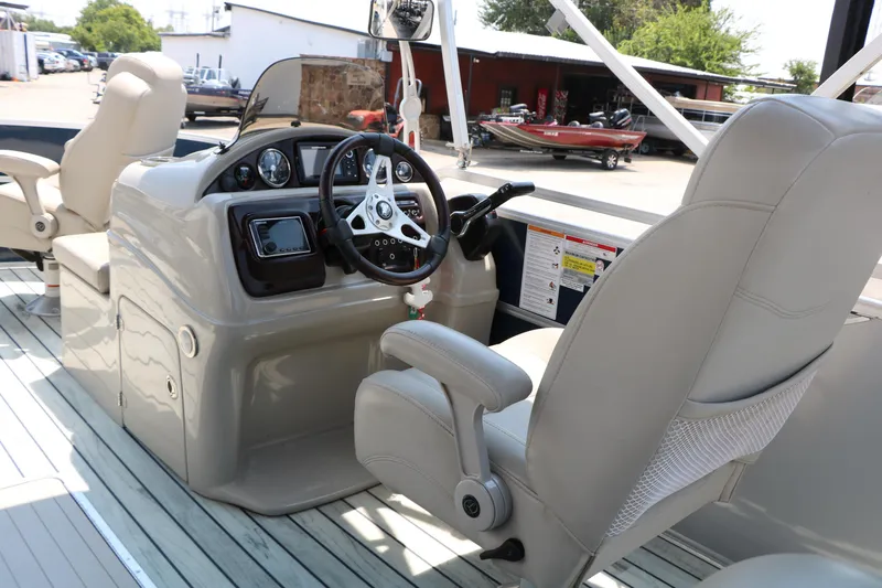 Slide: The Image of 2017 Trifecta 21 F Sts boat interior with steering console and comfortable seating. - 33