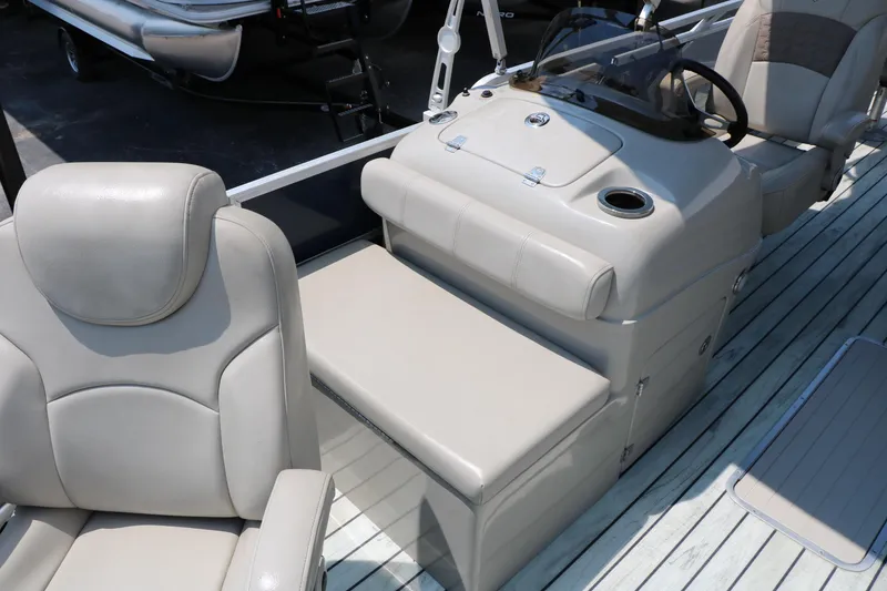 Slide: The Image of 2017 Trifecta 21 F Sts boat interior with beige seating and steering console. - 35
