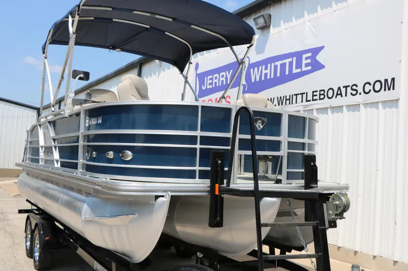 Slide: The Image of 2017 Trifecta 21 F Sts pontoon boat on trailer at dealership. - 5