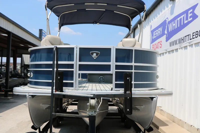 Slide: The Image of 2017 Trifecta 21 F Sts pontoon boat with canopy, displayed at dealership. - 7