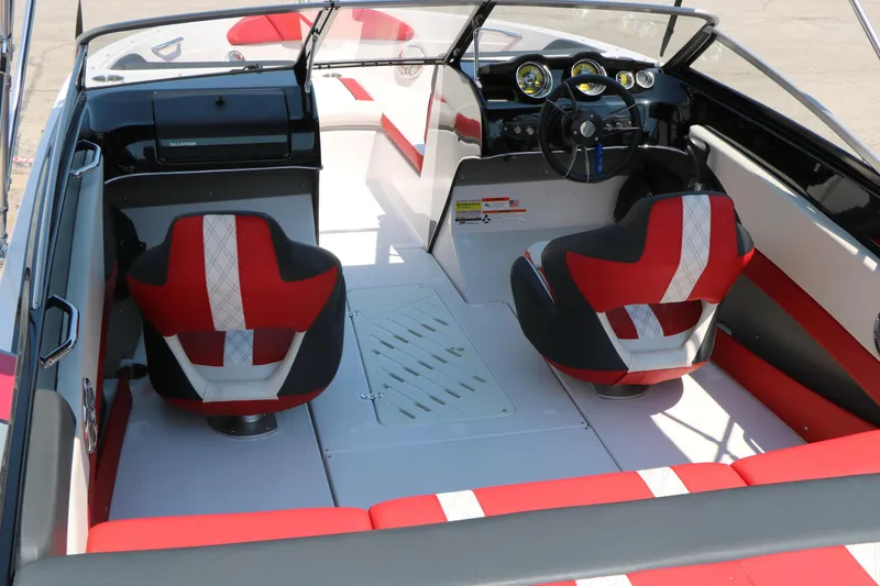 Slide: The Image of Interior of 2015 Glastron 205 GTS boat with red and white seating. - 16