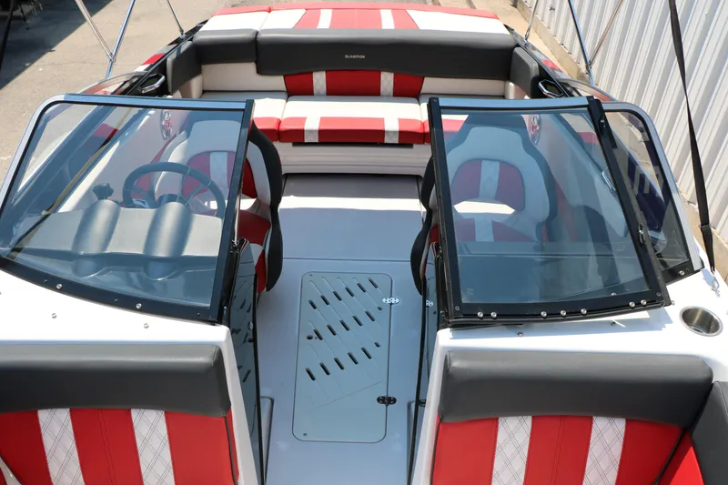Slide: The Image of 2015 Glastron 205 GTS boat interior with red and white seating, dual windshields. - 21