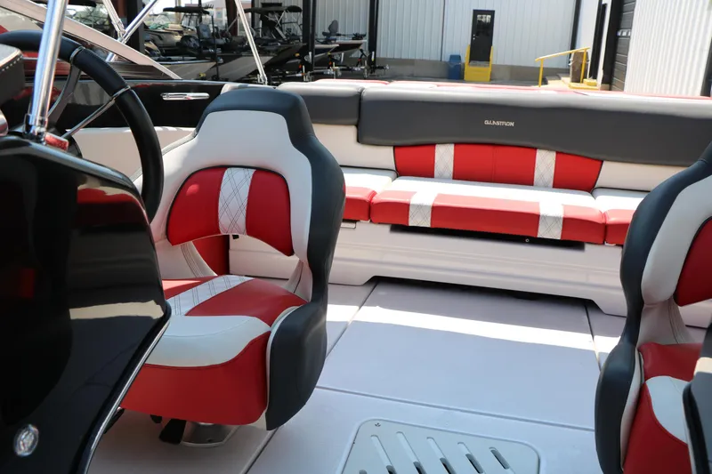 Slide: The Image of Interior of 2015 Glastron 205 GTS boat with red and white seating. - 23