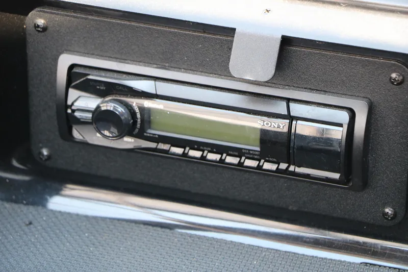 Slide: The Image of Sony stereo system in 2015 Glastron 205 GTS boat dashboard. - 25