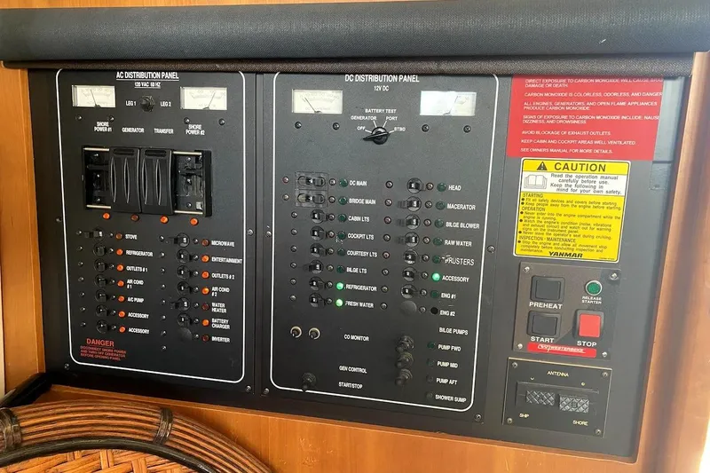 Slide: The Image of Electrical control panel on a 2005 Mainship 34 Trawler boat. - 20