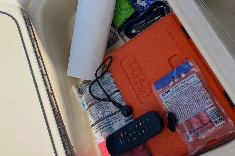 Slide: The Image of Flybridge storage both sides of helm - 24