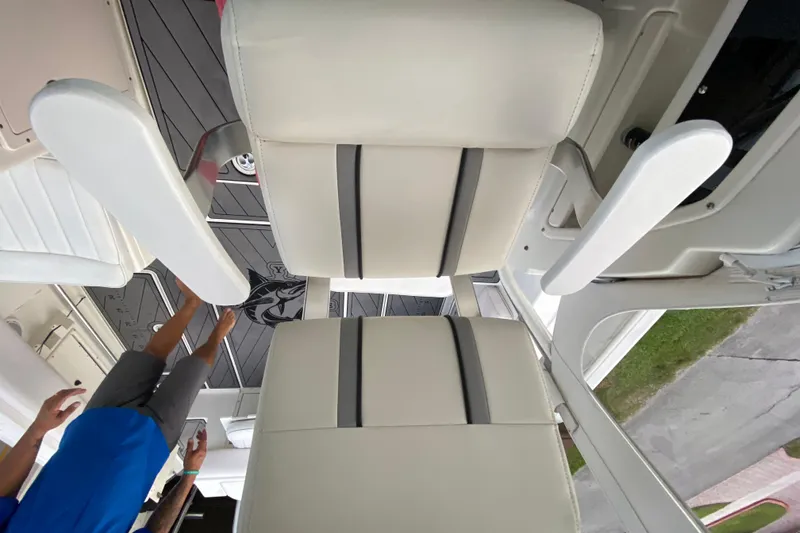Slide: The Image of 2004 Hydra-Sports Vector 2800 WA boat interior with white seating and armrests. - 20