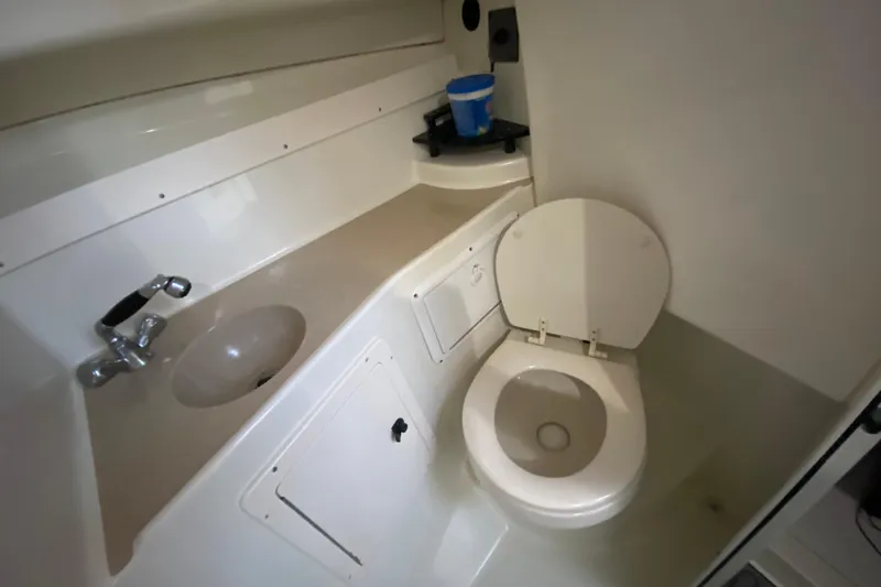 Slide: The Image of 2004 Hydra-Sports Vector 2800 WA boat bathroom with sink and toilet. - 23