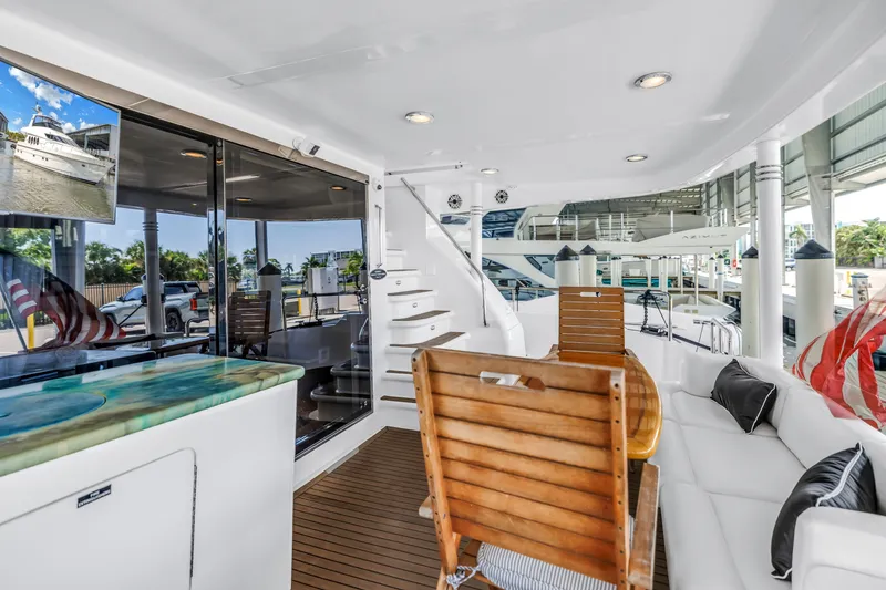 Slide: The Image of Luxurious 2000 Neptunus 65 Flybridge yacht interior with elegant seating and modern design. - 20