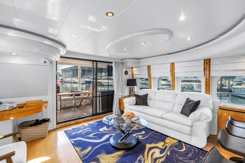 Slide: The Image of Luxurious Neptunus 65 Flybridge yacht interior, featuring elegant seating and stylish decor, year 2000. - 28