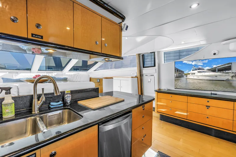 Slide: The Image of Luxurious Neptunus 65 Flybridge yacht interior with modern kitchen and scenic window view, 2000 model. - 33