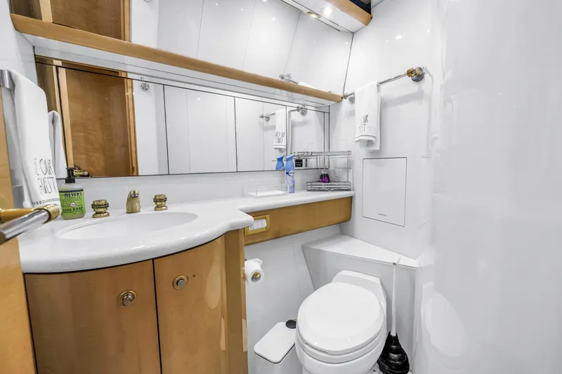 Slide: The Image of Luxurious bathroom in 2000 Neptunus 65 Flybridge yacht with modern fixtures and elegant design. - 41