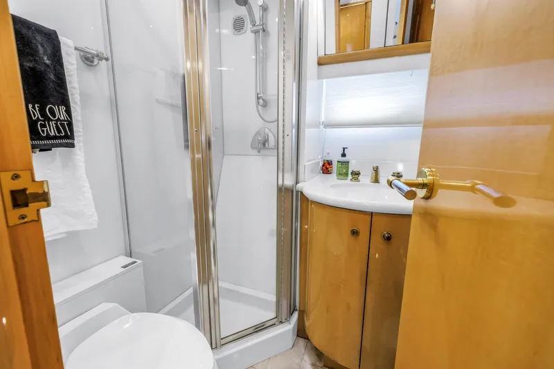 Slide: The Image of Luxurious bathroom on 2000 Neptunus 65 Flybridge yacht with shower and vanity. - 42