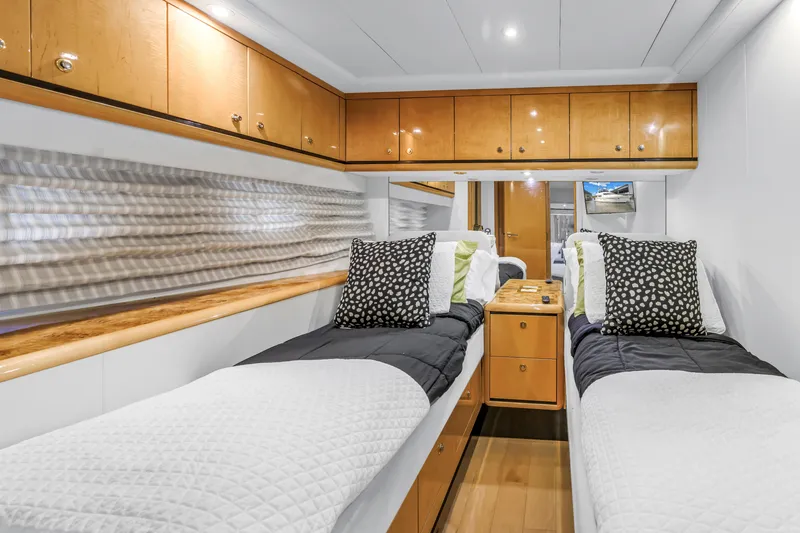 Slide: The Image of Luxurious twin cabin interior of 2000 Neptunus 65 Flybridge yacht. - 44