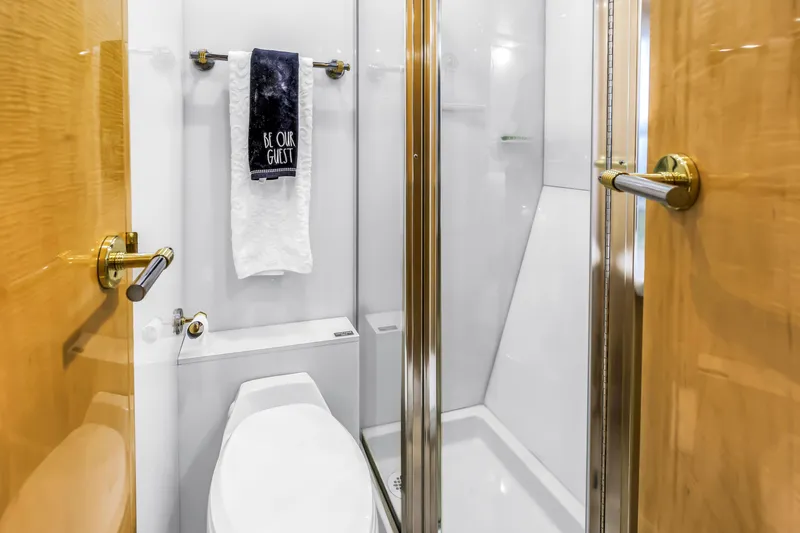 Slide: The Image of Luxurious bathroom on 2000 Neptunus 65 Flybridge yacht with modern fixtures and elegant design. - 47