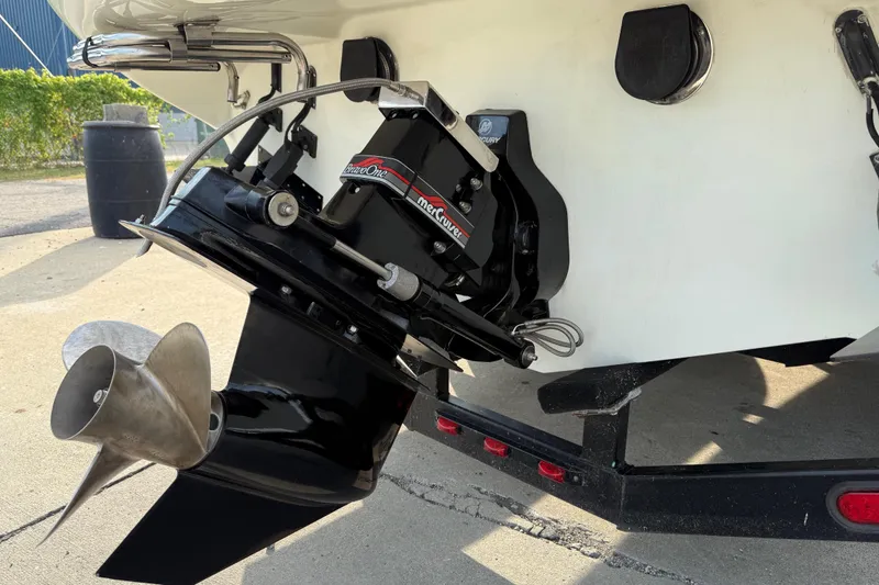 Slide: The Image of 1994 Baja Boss 272 boat with MerCruiser Bravo One outdrive and stainless steel propeller. - 10