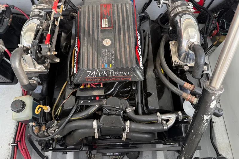 Slide: The Image of 1994 Baja Boss 272 engine compartment with MerCruiser 7.4L V8 Bravo engine. - 25