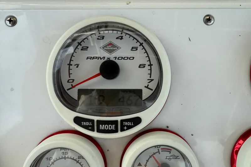 Slide: The Image of Close-up of a 2005 Fountain 34 Sportfish CC Open Bow tachometer displaying RPM. - 17
