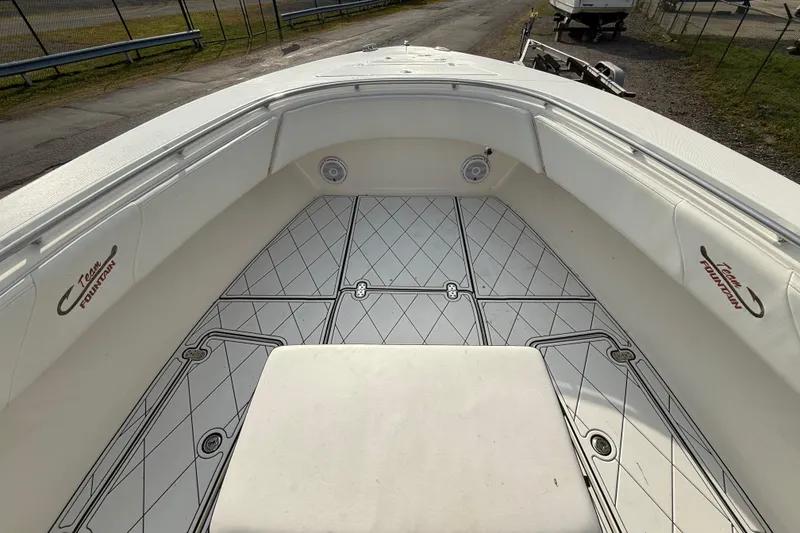 Slide: The Image of 2005 Fountain 34 Sportfish CC Open Bow with custom flooring and seating. - 21