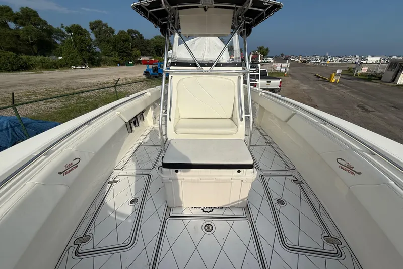 Slide: The Image of 2005 Fountain 34 Sportfish CC Open Bow boat with spacious deck and seating. - 24