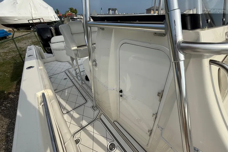 Slide: The Image of 2005 Fountain 34 Sportfish CC Open Bow, featuring sleek deck and seating area. - 26