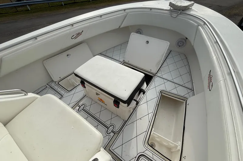 Slide: The Image of 2005 Fountain 34 Sportfish CC Open Bow with storage compartments and seating. - 31