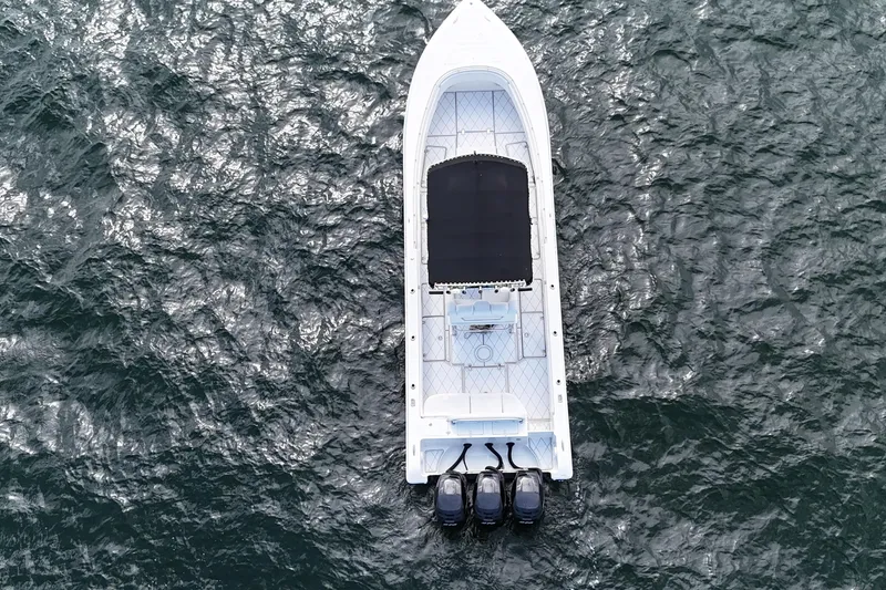 Slide: The Image of Aerial view of 2005 Fountain 34 Sportfish CC Open Bow on water. - 4