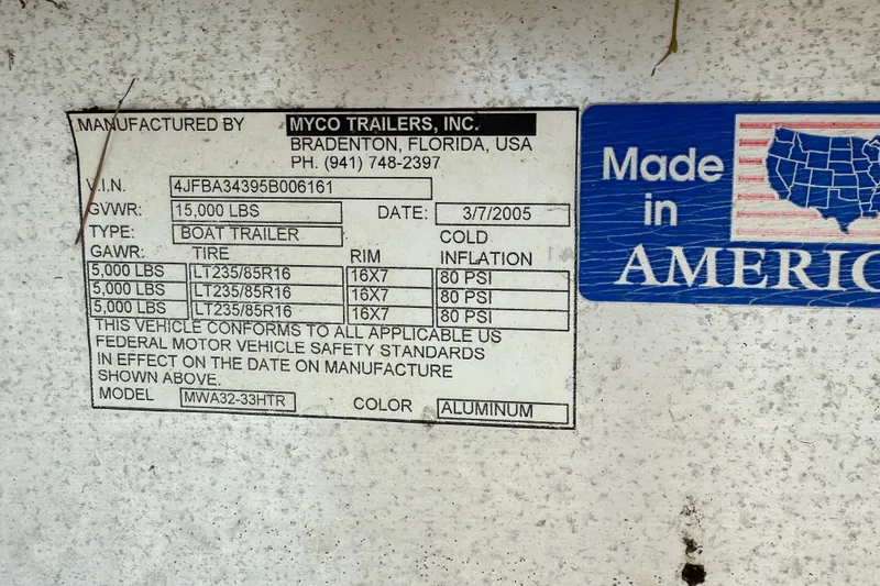 Slide: The Image of Label on Myco Trailers boat trailer, 2005, with specifications and "Made in America" sticker. - 44