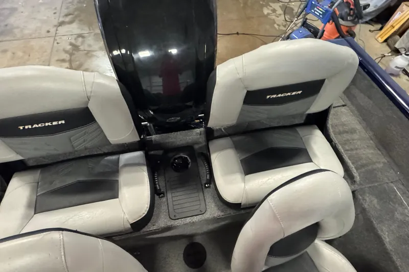 Slide: The Image of 2019 Tracker Pro Guide V-175 Combo boat interior with four seats. - 8