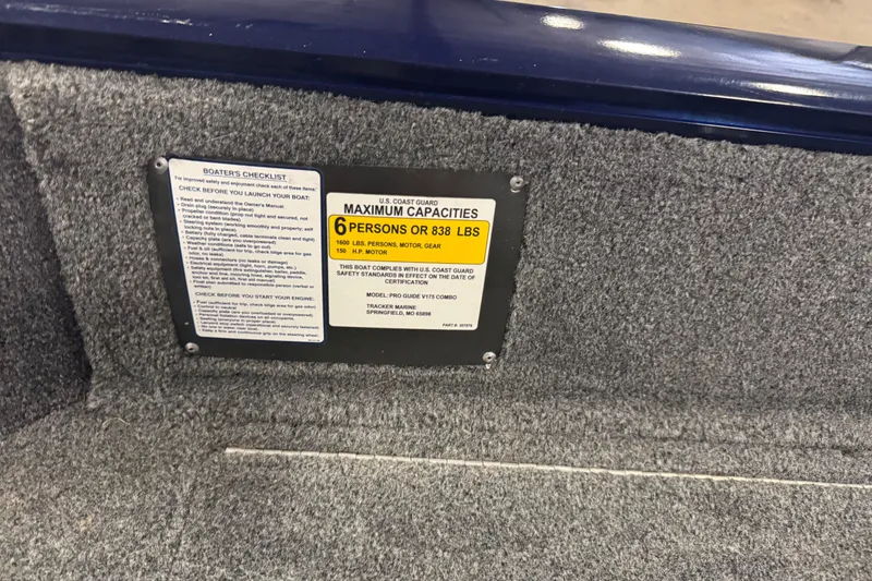 Slide: The Image of 2019 Tracker Pro Guide V-175 Combo capacity label, 6 persons or 838 lbs, safety instructions. - 9