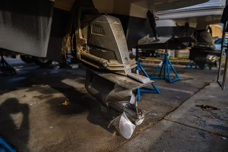 Slide: The Image of Outboard motor of a 2018 Chaparral 270 Signature boat on stands. - 11